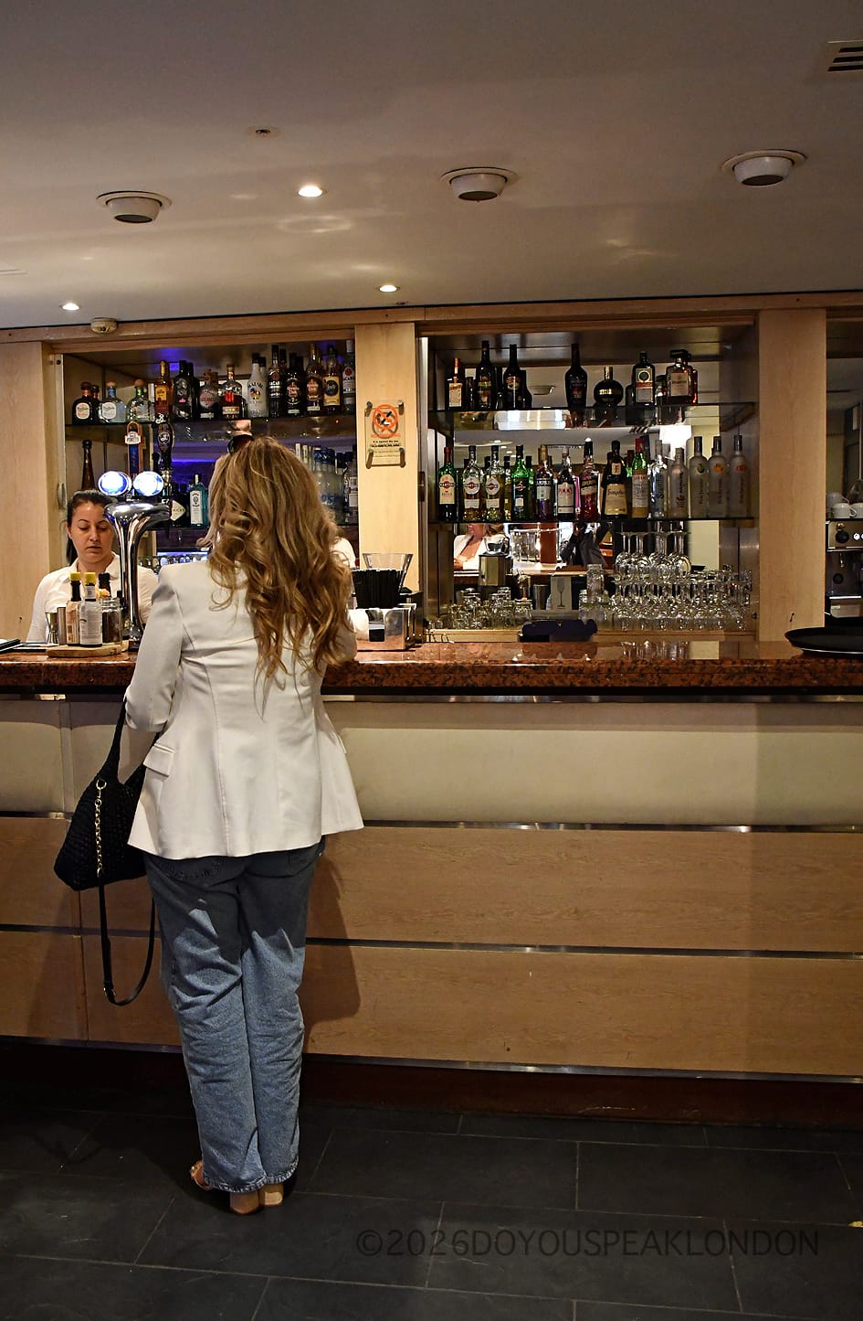 Ordering at the Courthouse Hotel bar in Soho
