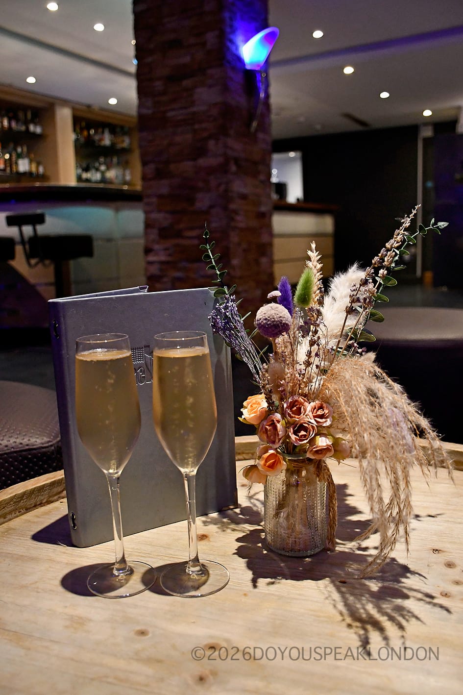 Two glasses of champagne at the Courthouse Hotel champagne cinema in Soho