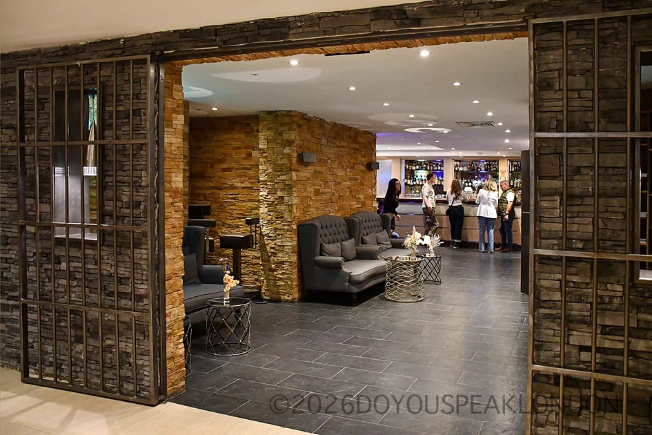 Iron bars at the entrance of the Courthouse Hotel bar in Soho