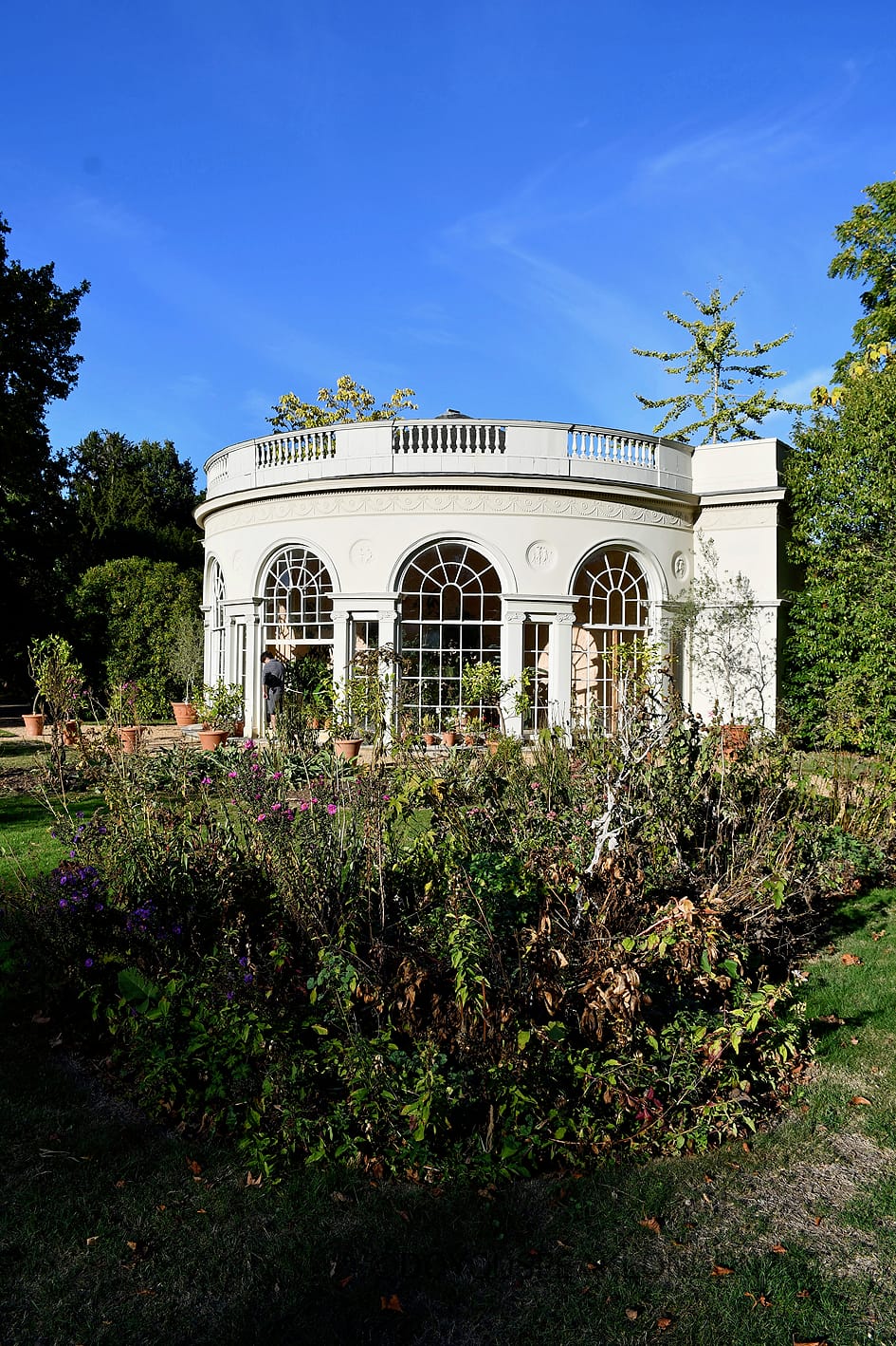Garden House surrounded by flowers in the gardens of Osterley Park