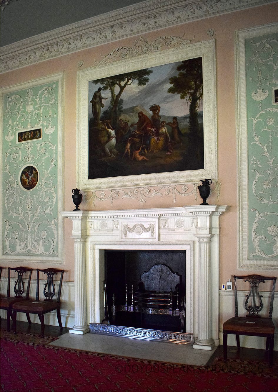 Eating Room fireplace and painting framed by Robert Adam stucco at Osterley House