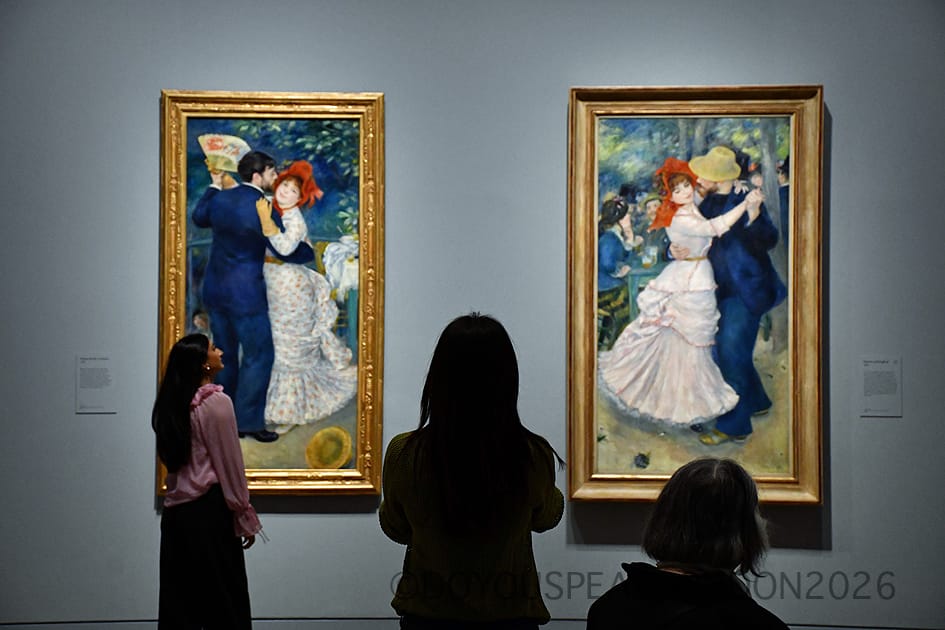 Visitors looking at Renoir's Dance in the Country and Dance at Bougival at the National Gallery