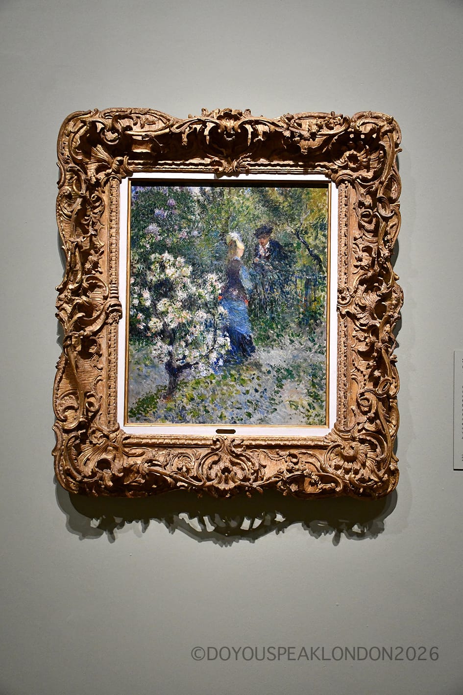 Renoir garden painting in an ornate gold frame at the National Gallery