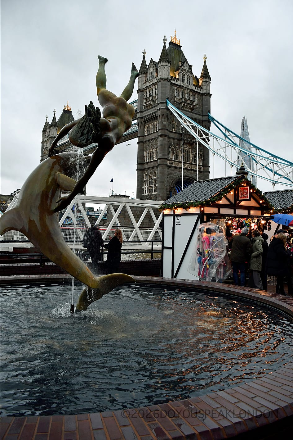 Girl with a Dolphin fountain by David Wynne next to Tower Bridge, near The Tower Hotel
