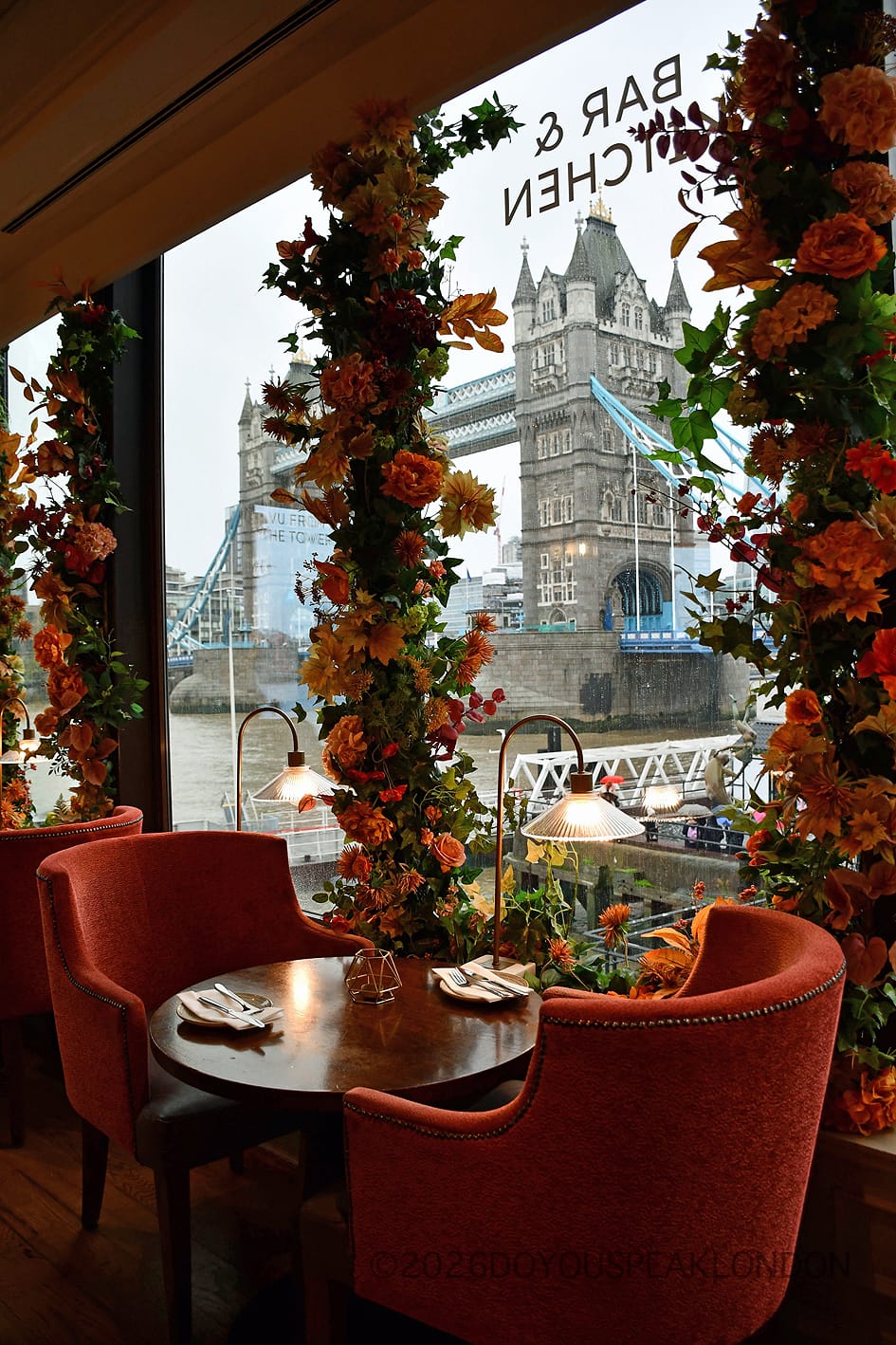 Table by the window with a view of Tower Bridge at VU from The Tower