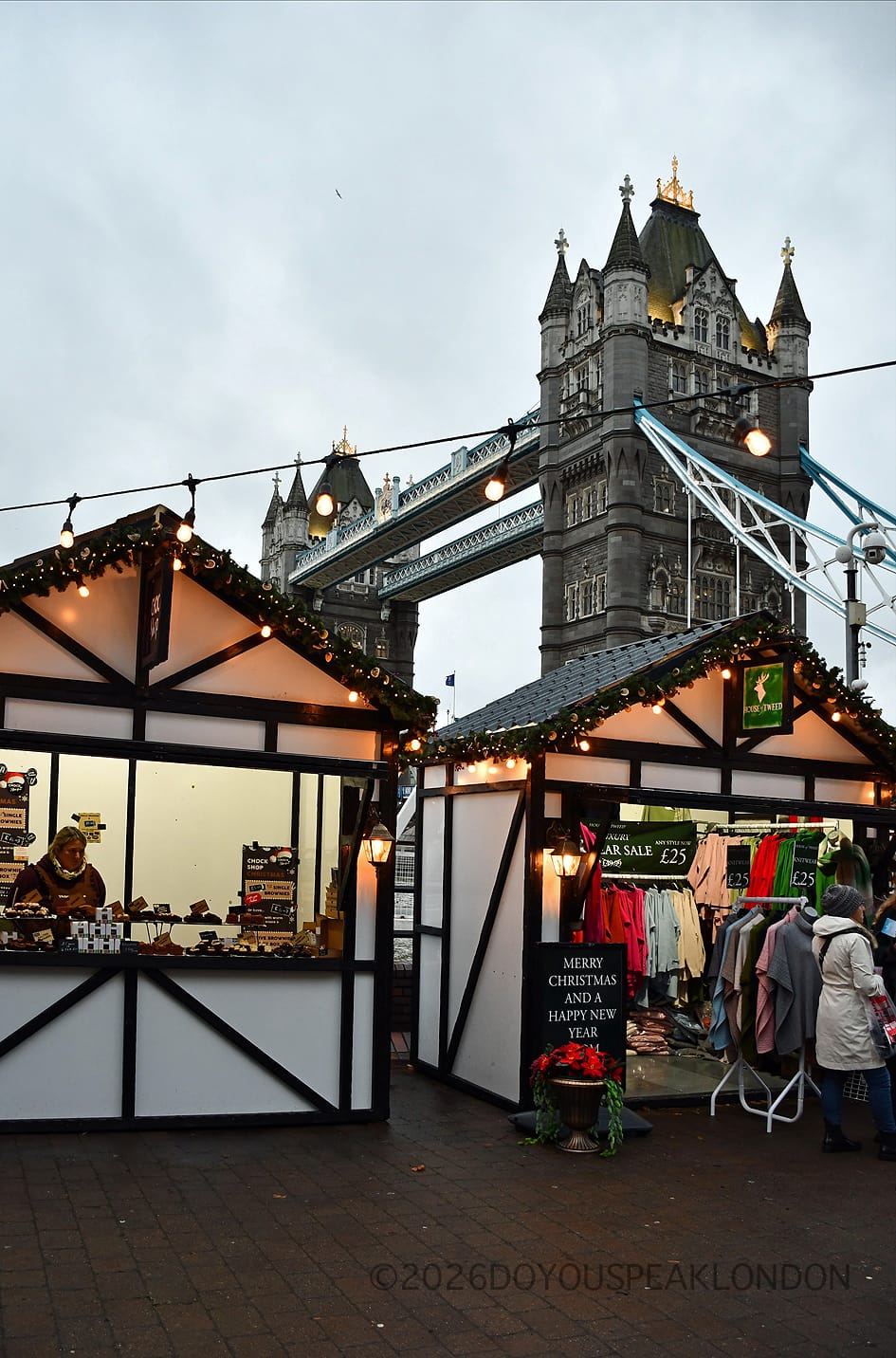 Christmas market huts in front of Tower Bridge near The Tower Hotel