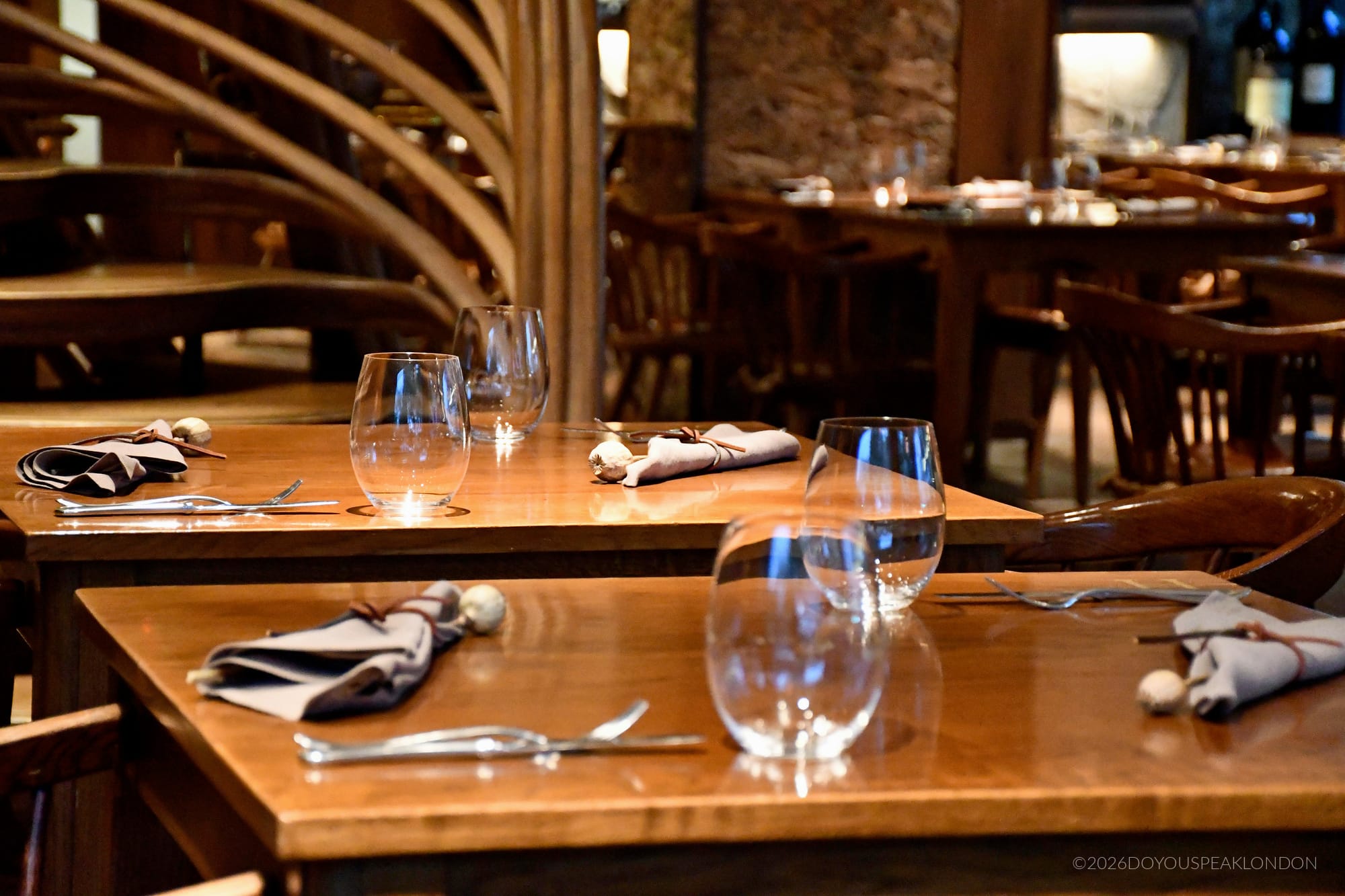 Breakfast tables beside the staircase at HIDE