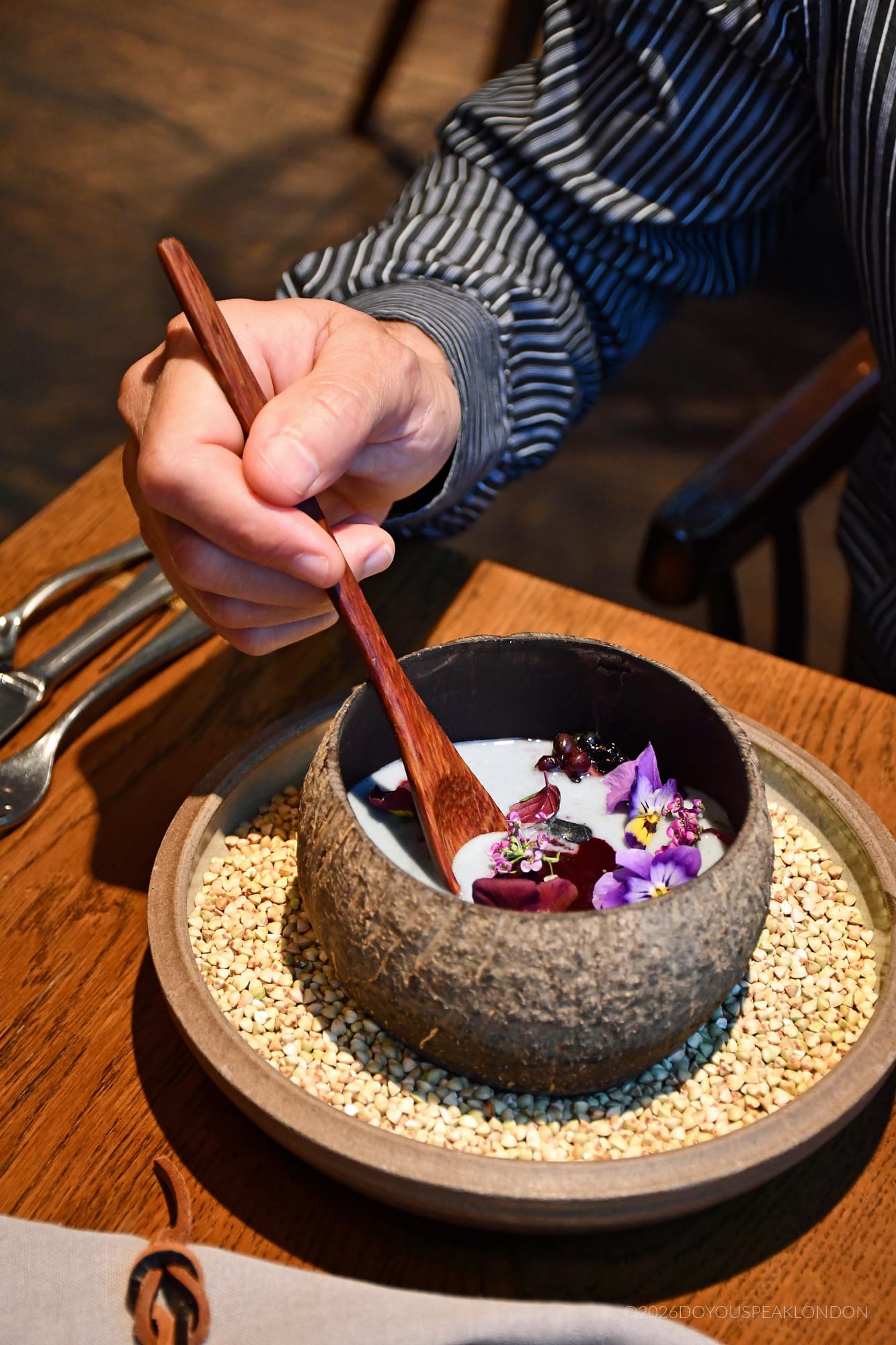 Tasting the acai bowl at HIDE restaurant Mayfair