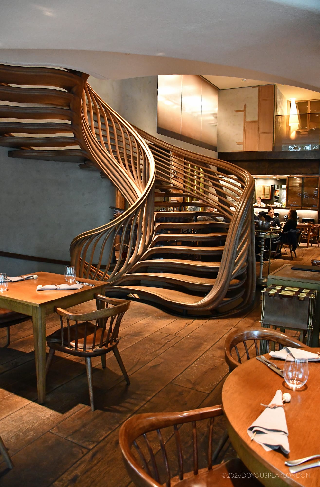 The oak staircase and dining room at HIDE restaurant Piccadilly